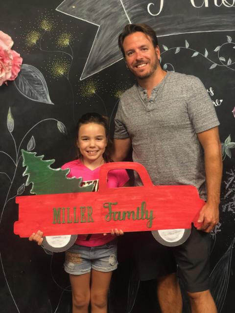 father daughter christmas winter tree truck - Brooke Roe