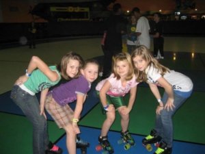 girls roller skating together